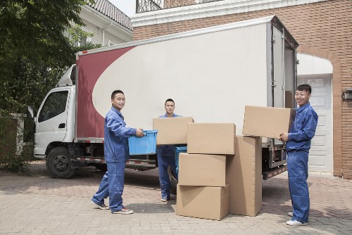 Man and van team handling boxes safely during a move in Finsbury Park