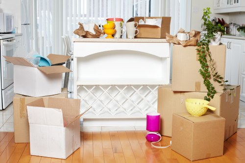 House movers organising boxes and household items for transport