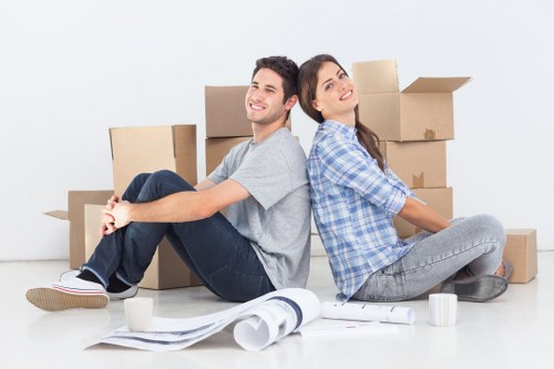 Team organising stock and office items during a commercial move