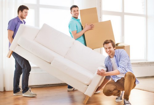 Packed office furniture and boxes ready for collection in North London