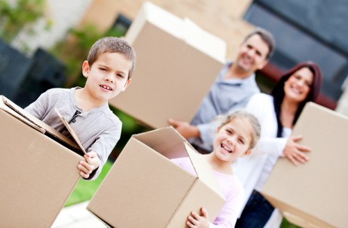 Securely packed moving van with strapped items and protective covers